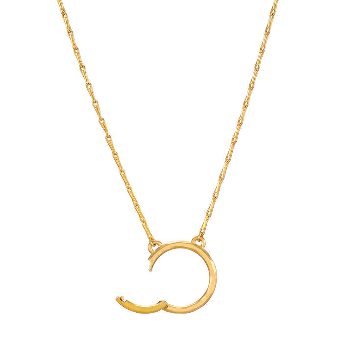 The 18" Chain Charm Necklace by Satya Jewelry showcases a stylish charm holder, gleaming in hammered 18kt gold plate. This piece serves as a meaningful charm for spiritual journeys, zodiac practices, and represents the sun and moon.