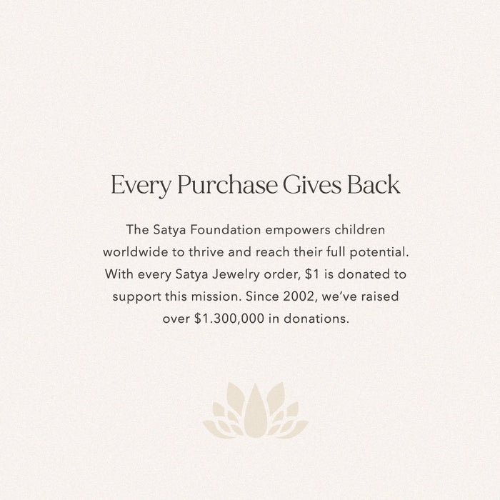 A visual of the Satya Foundation initiative that accompanies the Aligned in Purpose Chakra Necklace, emphasizing the impact of each purchase. This aligns with spiritual jewelry missions for meditation, mantra, and yoga, promoting meaningful giving and symbolic contributions to manifestation and sacred meanings.