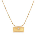 April White Topaz Sunburst Birthstone Tablet Necklace featuring a radiant sunburst design and white topaz, symbolizing individuality and creativity. This spiritual jewelry piece embodies the essence of meditation and serves as a meaningful talisman for protection and manifestation, perfect for yoga enthusiasts.