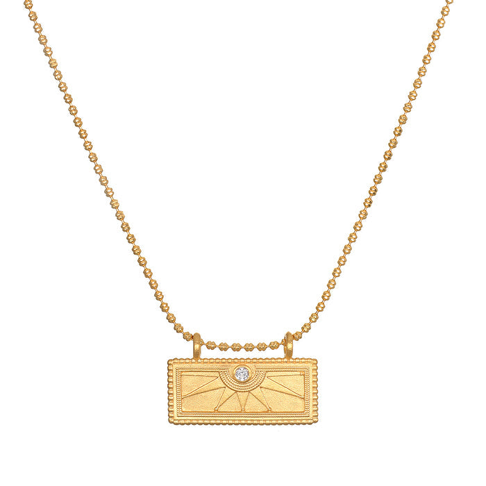 April White Topaz Sunburst Birthstone Tablet Necklace featuring a radiant sunburst design and white topaz, symbolizing individuality and creativity. This spiritual jewelry piece embodies the essence of meditation and serves as a meaningful talisman for protection and manifestation, perfect for yoga enthusiasts.
