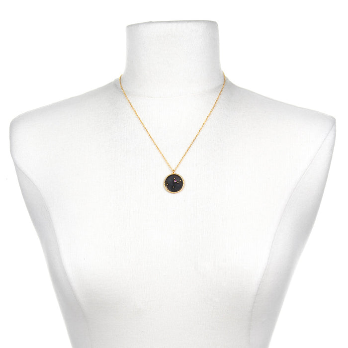Aquarius Zodiac Necklace displayed on a mannequin, showcasing its pendant. This significant spiritual jewelry embodies the essence of the zodiac with its symbolic meaning, perfect for spiritual seekers and yoga practitioners as a meaningful amulet.