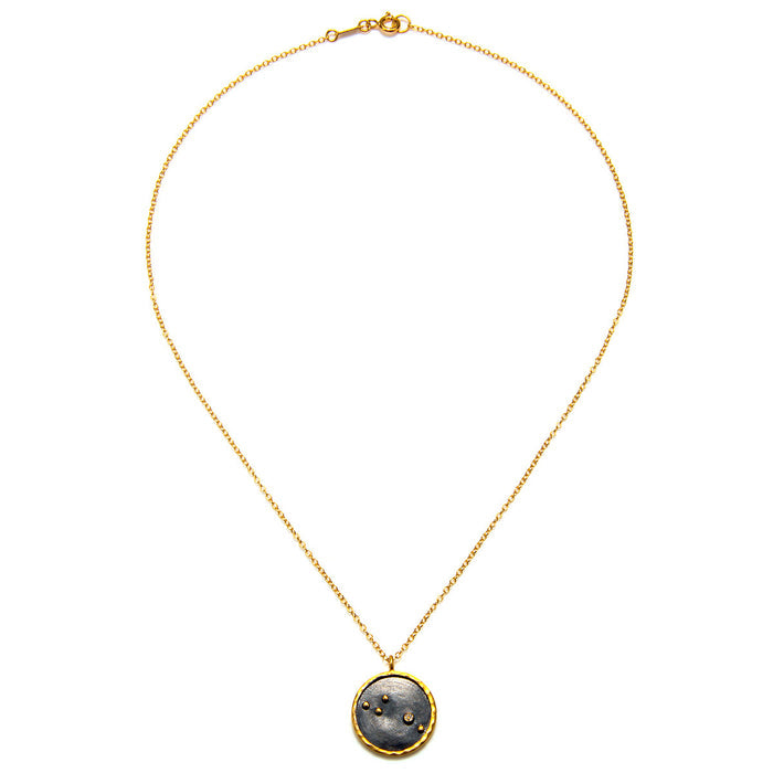 Elegant necklace with a dark gemstone pendant, embodying the essence of spiritual jewelry and meaningful meditation gifts. This Aries Zodiac Necklace serves as a unique amulet for manifestation and yoga practices, reflecting its sacred and protective qualities.