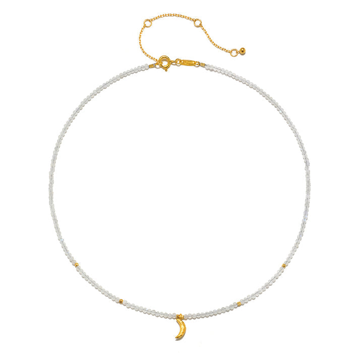 Close-up of the Awaken Intuition Moonstone Necklace highlighting the delicate beadwork and crescent moon charm, ideal for those seeking spiritual jewelry that inspires meaning, manifestation, and connection to zodiac influences in their daily life.