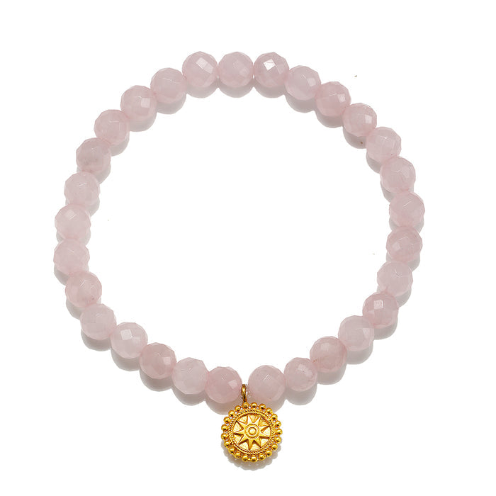 Awaken Love Mandala Rose Quartz Gemstone Bracelet featuring faceted rose quartz beads and a golden mandala charm, embodying spiritual jewelry ideals of love and compassion, perfect for meditation and as a talisman for meaningful manifestations in yoga and zodiac practices.