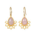 Awakened by Love Rose Quartz Lotus Petal Earrings showcasing a beautiful lotus petal design, made of rose quartz which symbolizes love and transformation. Perfect for spiritual jewelry, this piece enhances your meditation practice and serves as a meaningful talisman for protection and manifestation. Ideal for enhancing your yoga sessions, this jewelry embodies the essence of the sun and moon in its elegant design.
