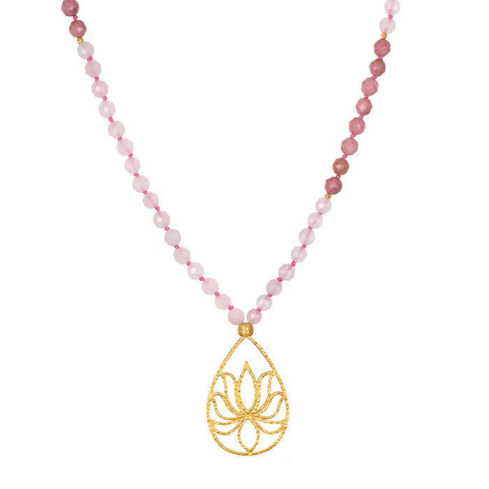 Bloom In Love Rose Quartz Lotus Mala with rose quartz beads and a gold-plated lotus pendant, symbolizing unconditional love and new beginnings. Ideal spiritual jewelry for meditation and manifestation practices, serving as a protective talisman. A meaningful accessory for yoga enthusiasts and those interested in zodiac charms.