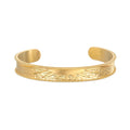 Breaking Dawn Sunrise Cuff bracelet showcasing an elegant etched sunrise design, perfect for spiritual jewelry and meditation. This 18kt gold plated cuff embodies the sun's energy, making it a meaningful talisman for yoga and manifestation.
