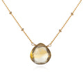 Brighter Than Sunshine Citrine Necklace featuring a radiant citrine briolette, ideal for spiritual jewelry and meditation. This meaningful piece serves as a talisman for protection and manifestation, embodying the essence of the sun. Perfect for yoga practitioners and those seeking deeper spiritual connections with zodiac meanings.