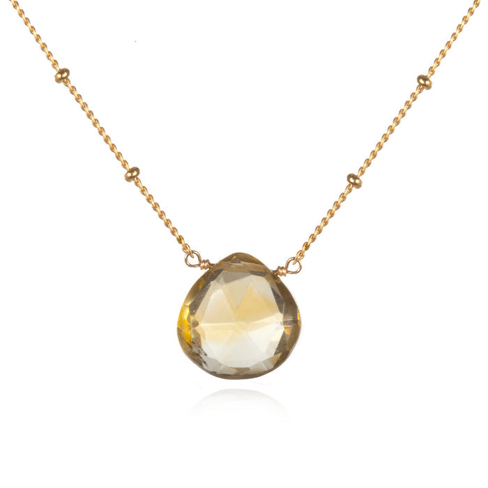 Brighter Than Sunshine Citrine Necklace featuring a radiant citrine briolette, ideal for spiritual jewelry and meditation. This meaningful piece serves as a talisman for protection and manifestation, embodying the essence of the sun. Perfect for yoga practitioners and those seeking deeper spiritual connections with zodiac meanings.