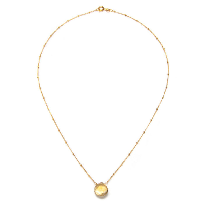 A close-up shot of the Brighter Than Sunshine Citrine Necklace against a clean background, emphasizing its radiant citrine stone and golden chain, a beautiful piece of spiritual jewelry for meditation and zodiac alignment.
