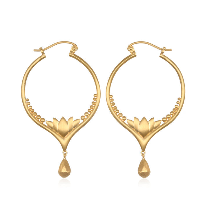 Brilliant Beginnings Earrings featuring lotus flower design, symbolizing new beginnings and full potential. These spiritual jewelry pieces are ideal meditation gifts for yoga enthusiasts, embodying meaningful elements for manifestation and protection, making them a sacred addition to any zodiac collection.