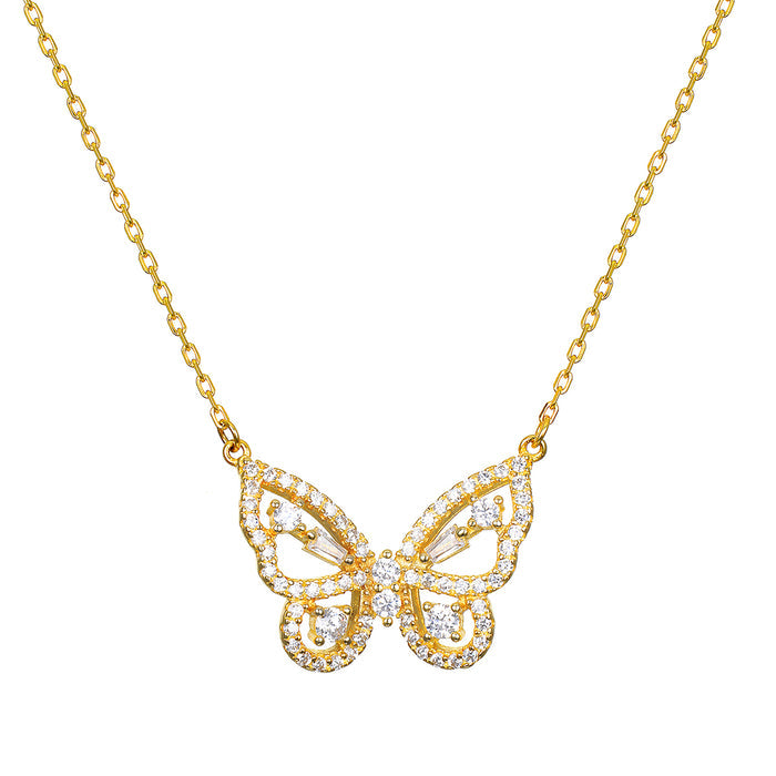 Gold-tone necklace with butterfly pendant outlined and filled with cubic zirconia stones on cable chain.