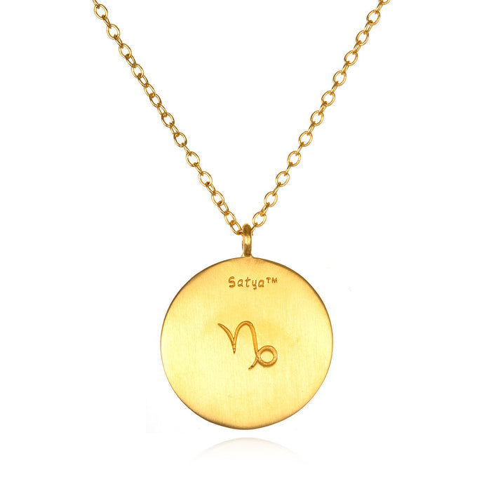 Close-up of the Capricorn Zodiac Necklace featuring a gold pendant engraved with the Capricorn symbol. This sacred piece of spiritual jewelry embodies meaningful connections, perfect for mantra meditation and zodiac empowerment.