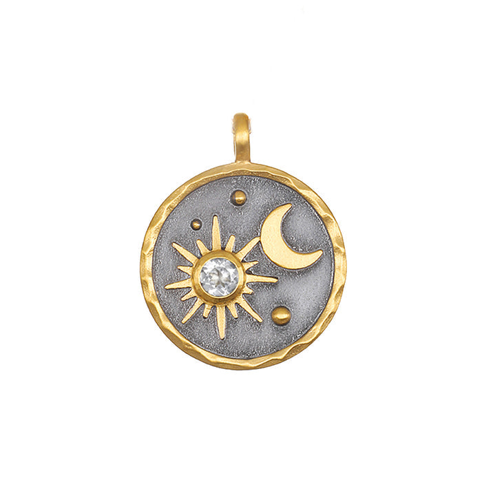 Celestial Alignment Charm pendant featuring a radiant sunburst, crescent moon, and white topaz. This spiritual jewelry piece symbolizes protection and manifestation, perfect for meditation and yoga practices.