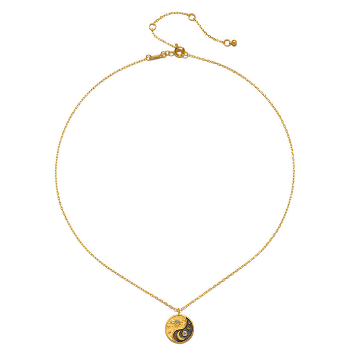 Celestial Balance Yin Yang White Topaz Necklace designed for spiritual jewelry enthusiasts, featuring a beautifully balanced yin yang symbol alongside celestial elements like the sun and moon. This meaningful piece serves as a talisman for meditation, yoga, and personal manifestation, embodying the essence of protection and harmony.