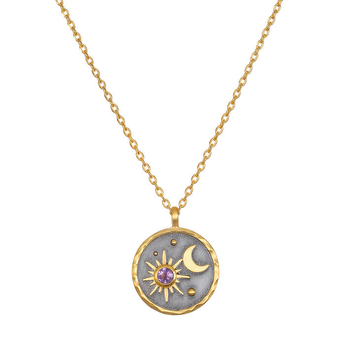 Celestial Birthstone Necklace - February featuring a striking pendant that combines 18kt gold plate with a gunmetal design, adorned with an amethyst, symbolizing spirituality and peace. This meaningful necklace embodies meditation, protection, and manifestation, evoking a connection to the sun and moon, perfect for yoga enthusiasts.