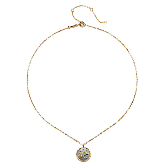 Celestial Birthstone Necklace - March featuring an aquamarine accent pendant set against a gunmetal background, embodying spiritual jewelry ideals with cosmic elements like the sun and moon, perfect for meditation and manifestation.