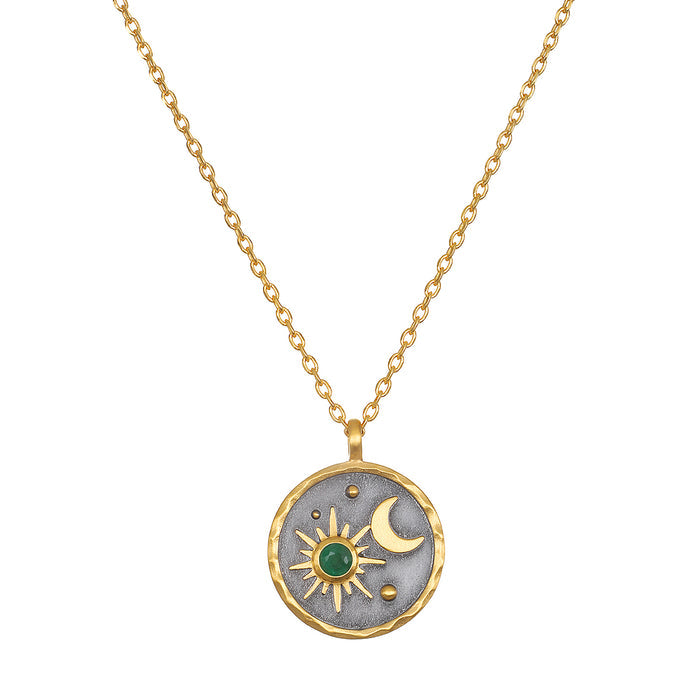 Celestial Birthstone Necklace - May featuring a sun and moon design in 18kt gold plate, set against a gunmetal background, perfect for spiritual jewelry, meditation, and as a talisman for manifestation.