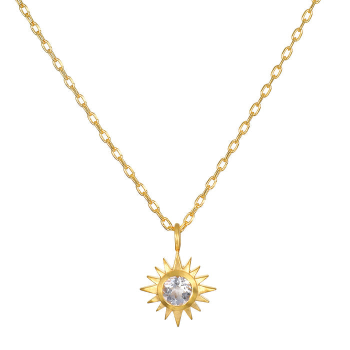 Clarity White Topaz Starburst Necklace featuring an exquisite 18kt gold plated design with a shining starburst pendant, symbolizing dreams and guidance. This spiritual jewelry is perfect for meditation and as a meaningful talisman for zodiac enthusiasts, enhancing intuition and protection. Ideal for yoga practices, it represents the sun and moon's connection, making it a powerful piece for manifestation and personal growth.