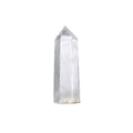 A clear quartz crystal, known for its healing properties, ideal for spiritual jewelry and meditation. This elegant talisman enhances manifestation and is perfect for yoga and zodiac practices, symbolizing protection and balance under the sun and moon.