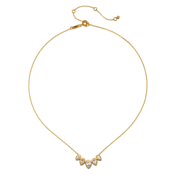 An elegant display of the Commence with Clarity White Topaz Lotus Petal Necklace, highlighting its delicate design and gold finish. This spiritual jewelry piece embodies the essence of meditation, manifestation, and serves as a talisman for renewal, making it a meaningful addition to any collection.