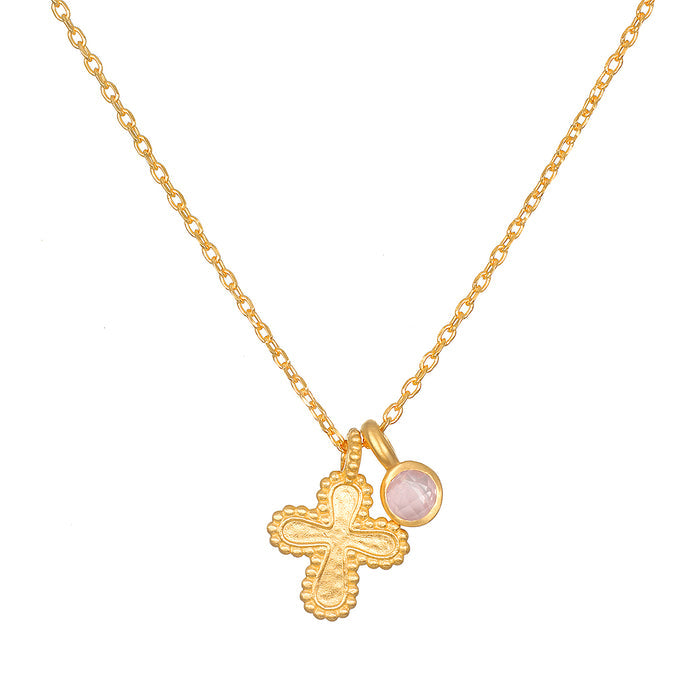 The Compassionate Faith Rose Quartz Cross Necklace featuring an intricately designed 18kt gold plated cross pendant alongside a glowing rose quartz charm, perfect for spiritual jewelry, meditation, and meaningful manifestation.