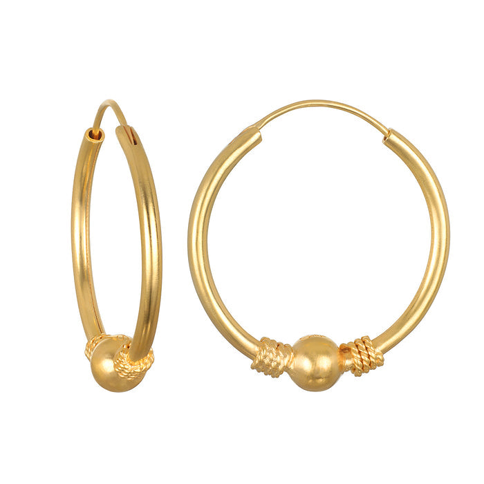 Featuring the Courageous Spirit Earrings, these stunning hoop earrings in 18kt gold plate embody spiritual jewelry and meaningful design. Perfect for meditation and yoga practice, they serve as a talisman of protection and intention, reflecting the sun and moon's energy. Ideal for those who appreciate a detailed aesthetic with a bold bead and delicate rope detail, these earrings embrace the essence of manifestation and connection to one's zodiac.