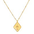 Cradled in Protection Gold Hamsa Necklace, an intricately designed spiritual jewelry piece symbolizing protection and blessings. This talisman features a hamsa hand with an evil eye and emerald gemstone, making it a meaningful charm for meditation and manifestation in your yoga practice. Perfect for those who resonate with zodiac energies, this necklace embodies the essence of sun and moon, enhancing your spiritual journey.
