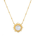 Gold-tone necklace with a sun-shaped pendant featuring a white iridescent moonstone center and beaded chain.