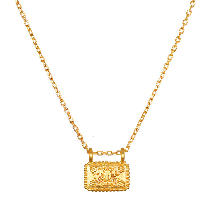 Dawn of Renewal Lotus Necklace featuring an intricate lotus flower engraved on a delicate rectangular pendant, symbolizing new beginnings. This spiritual jewelry piece is perfect for meditation, serving as a talisman for manifestation and meaningful protection during yoga practice.
