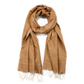 Dhuli Silk Scarf by Yarn Glory, made from 100% hand spun yarn and dyed with natural tea leaves, embodies elegance and sustainability. Its unique texture and design make it a perfect accessory for those who appreciate spiritual jewelry, meditation, and meaningful talismans. Ideal for yoga enthusiasts and individuals interested in meaningful manifestation, this scarf represents protection and harmony, capturing the essence of the sun and moon.