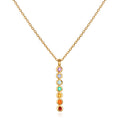 Divine Alignment Gemstone Chakra Necklace featuring vibrant gemstones including amethyst, blue agate, blue topaz, green onyx, citrine, carnelian, and red garnet in a vertical design. This spiritual jewelry piece is perfect for meditation gifts, mantra practice, and yoga. Its meaningful, symbolic nature aids in manifestation while offering protection and connection to sacred energy, making it an ideal amulet for zodiac enthusiasts.