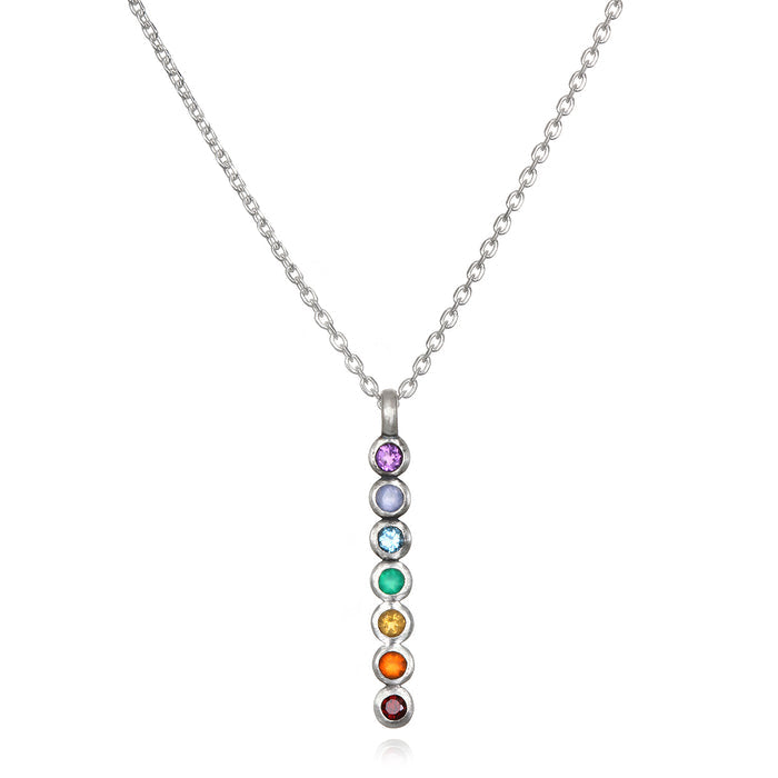 Divine Alignment Gemstone Chakra Silver Necklace featuring seven colorful gemstones representing the chakras, ideal for spiritual jewelry, meditation gifts, and symbolic meaning. Perfect for yoga and manifestation enthusiasts.