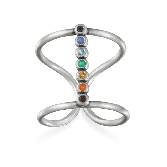 Divine Alignment Silver Chakra Ring featuring vibrant gemstones representing the seven chakras. This spiritual jewelry is perfect for meditation gifts, symbolizing meaningful and protective energy for yoga practices. A beautiful amulet that reflects the manifestation and deeper meaning of sacred energy, connecting wearers to their zodiac and spiritual journey.