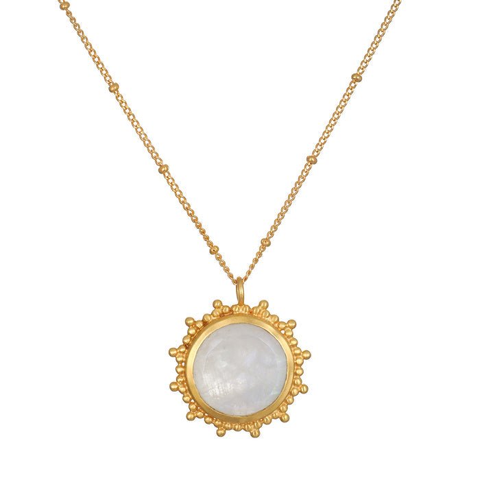 Drift Into Daydreams Moonstone Gemstone Necklace featuring a stunning moonstone pendant surrounded by an intricate beaded starburst design in 18kt gold plate, embodying spiritual jewelry and meaning for meditation and manifestation.