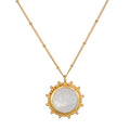 Drift Into Daydreams Moonstone Gemstone Necklace featuring a stunning moonstone pendant surrounded by an intricate beaded starburst design in 18kt gold plate, embodying spiritual jewelry and meaning for meditation and manifestation.