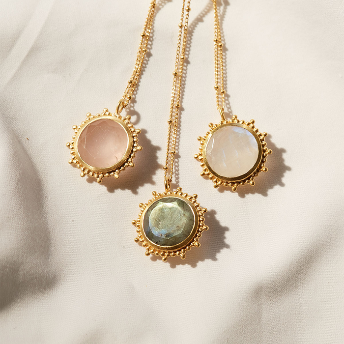 Drift Into Daydreams Moonstone Gemstone Necklace featuring three stunning moonstone pendants surrounded by beaded starburst designs, ideal for spiritual jewelry, meditation, and as a talisman representing zodiac meanings, protection, and manifestation during yoga.