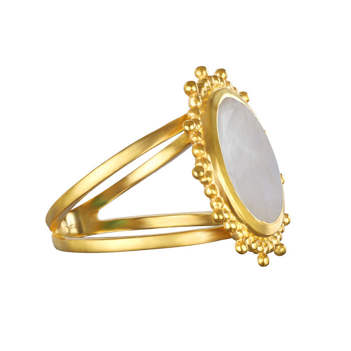 A side view of the Drift Into Daydreams Moonstone Ring, showing off its luminous moonstone and golden details, ideal for those interested in spiritual and zodiac-inspired adornments.