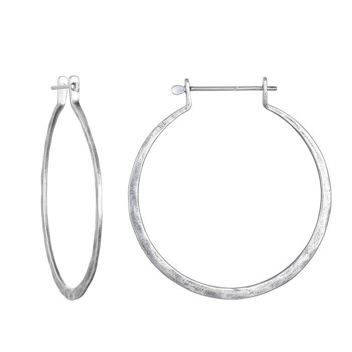 Effortless Simplicity Silver Earrings showcasing beautiful hoop designs made from gleaming sterling silver, ideal for everyday wear, embodying the essence of spiritual jewelry and meaning. Perfect for meditation and yoga practices, these earrings serve as a meaningful talisman for protection, manifestation, and charm.