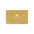 Elegant eGift Card design for SATYA Jewelry featuring a serene gold background with lotus patterns. Ideal for sharing meaningful gifts that embody spiritual jewelry values such as meditation, talisman energy, zodiac connections, and protection symbolism. Perfect for those seeking to manifest positivity and charm in their lives, aligning with yoga and spiritual practices.