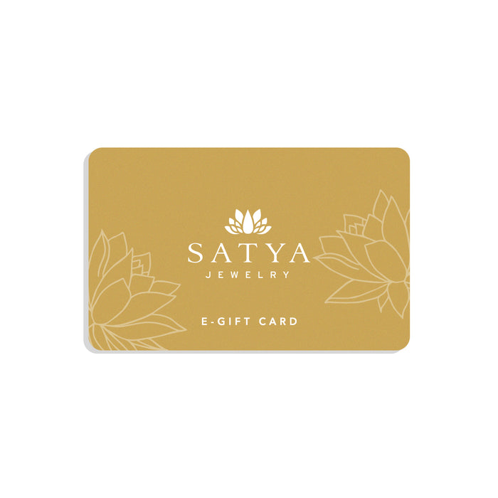 Elegant eGift Card design for SATYA Jewelry featuring a serene gold background with lotus patterns. Ideal for sharing meaningful gifts that embody spiritual jewelry values such as meditation, talisman energy, zodiac connections, and protection symbolism. Perfect for those seeking to manifest positivity and charm in their lives, aligning with yoga and spiritual practices.