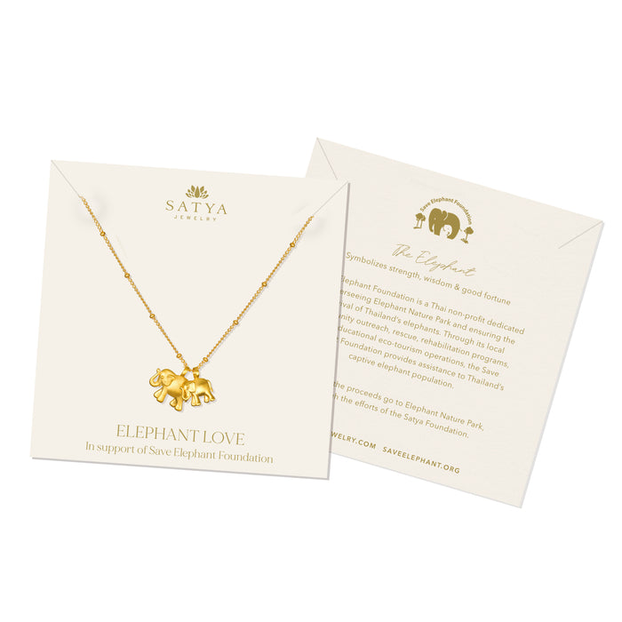 The packaging for the Elephant Love Gold Necklace, highlighting its support for the Save Elephant Foundation, serves as a meaningful charm representing wisdom and protection in your spiritual journey.