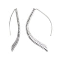Embody Grace Lotus Petal Silver Earrings showcasing their elegant design with a unique curved shape, perfect for spiritual jewelry, meditation, and representing new beginnings. Ideal for yoga and meaningful manifestations.