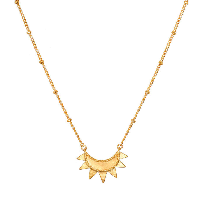 Emergence Gold Sunburst Necklace showcasing an intricate sunburst design, symbolizing vitality and leadership, perfect for spiritual jewelry and meditation, adding meaning and charm to any yoga practice.
