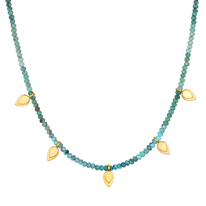 Emerging Hope Turquoise Petal Choker Necklace displayed elegantly, featuring turquoise beads and golden lotus petal accents, capturing the essence of spiritual jewelry, meditation, and talisman meaning.