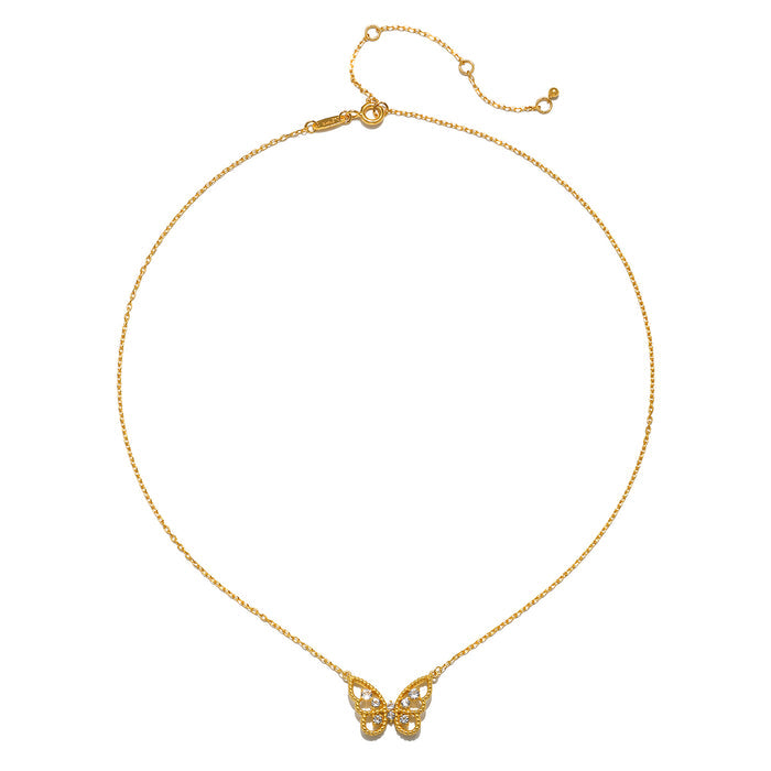 Gold-tone chain necklace with butterfly pendant set with clear crystals and adjustable clasp.