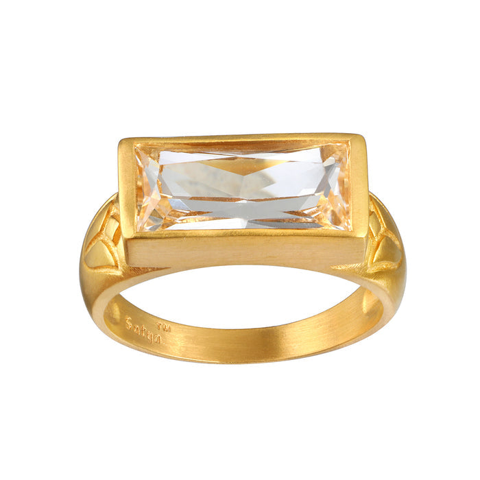 Eternal Radiance White Topaz Ring featuring a brilliant faceted white topaz on an 18kt gold plated band. This spiritual jewelry piece embodies individuality and creativity, perfect for meditation and as a talisman. Its design is meaningful for those seeking protection and alignment with the sun and moon energies, making it ideal for yoga practitioners and those focused on manifestation.