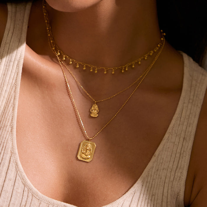 Close-up of the Favored by Fortune Ganesha Necklace, showcasing its intricate design, perfect for yoga practice and daily wear as a symbol of protection and spiritual connection.