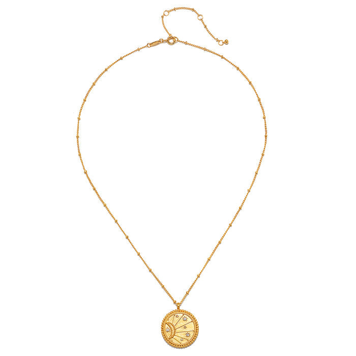 Front perspective of the First Light Gold Medallion Reversible Pendant Necklace displaying an elegant sun design, embodying the essence of spiritual jewelry for zodiac and meaningful manifestation.