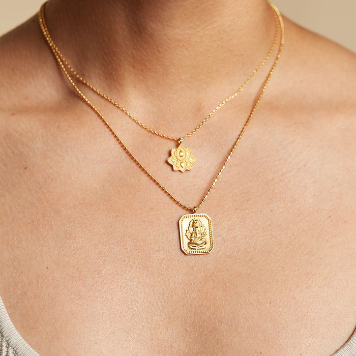 Close-up view of Ganesha Hindu God, Bestower of Good Fortune Necklace showcasing intricate design, embodying spiritual values. This meaningful charm is perfect for meditation, zodiac practices, and adding protection and significance to any outfit.